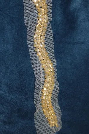 Gilded Elegance: Opulent Handcrafted Lace with Golden Embellishments